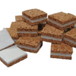 CORCHOS + PVC (2+2) 18X18X2+2 MM 1 CAJA (40.000 UND)